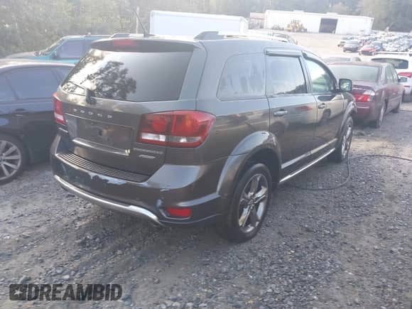 2017 Dodge Journey Crossroad Plus with VIN 3C4PDCGG0HT581215, listed as a IAAI auction lot 43418106 with 164,912 mi miles and . Bid and sale history available at DreamBid. Image 4.