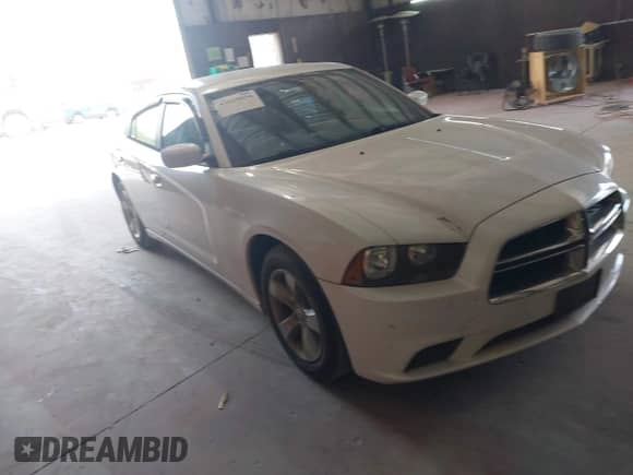 2014 Dodge Charger SE z VIN 2C3CDXBGXEH192832, wystawiony jako IAAI lot #41029054 z przebiegiem 98 388 mil mil oraz . Historia ofert i sprzedaży dostępna na DreamBid. Obrazek 1.
