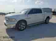 2014 Ram 1500 Laramie with VIN 1C6RR6NT0ES388966, listed as a Copart auction lot 59334475 with 302,512 mi miles and Salvage title. Bid and sale history available at DreamBid. Image 1.