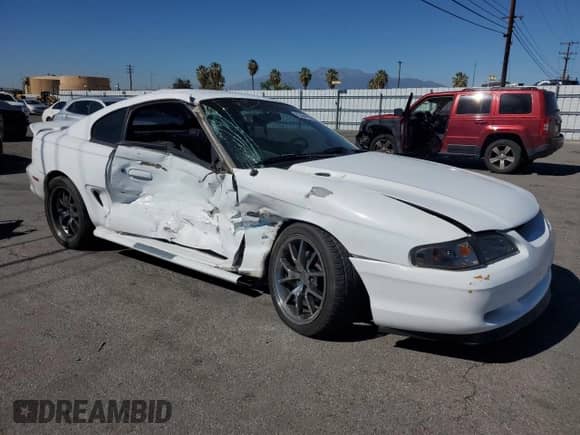 1998 Ford Mustang GT z VIN 1FAFP42X9WF179805, wystawiony jako Copart lot #82494395 z przebiegiem 142 724 mil mil oraz Szkoda całkowita • Salvage title. Historia ofert i sprzedaży dostępna na DreamBid. Obrazek 4.