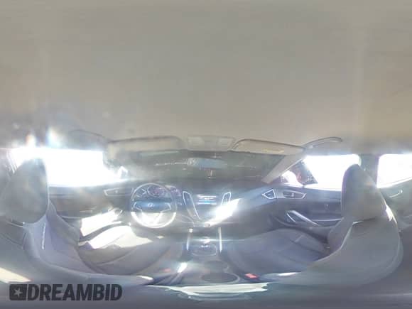 2013 Hyundai Veloster w/Black Int с VIN KMHTC6AD0DU166697, выставлен на аукционе Copart как лот 71646805 с пробегом 158 640 миль миль и Списание • Salvage title. История ставок и продаж доступна на DreamBid. Изображение 15.