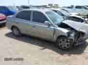 2005 Hyundai Accent GLS z VIN KMHCG45C55U608336, wystawiony jako IAAI lot #42743218 z przebiegiem 221 254 mil mil oraz . Historia ofert i sprzedaży dostępna na DreamBid. Obrazek 13.