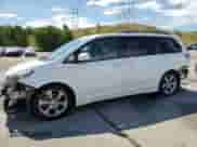 2013 Toyota Sienna SE with VIN 5TDXK3DC5DS394290, listed as a Copart auction lot 64800965 with 149,374 mi miles and Salvage title. Bid and sale history available at DreamBid. Image 1.