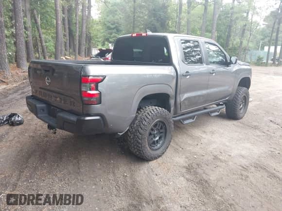 2022 Nissan Frontier SV with VIN 1N6ED1EK9NN638457, listed as a IAAI auction lot 43312020 with 20,033 mi miles and . Bid and sale history available at DreamBid. Image 4.