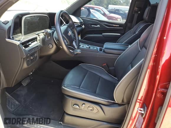 2023 Cadillac Escalade 4WD Sport with VIN 1GYS4FKL8PR325468, listed as a Copart auction lot 55700105 with 33,284 mi miles and Salvage title. Bid and sale history available at DreamBid. Image 7.