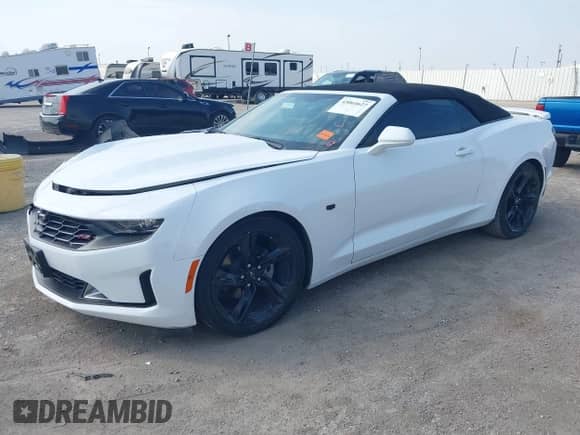 2021 Chevrolet Camaro 1LT with VIN 1G1FB3DX9M0112937, listed as a IAAI auction lot 43064627 with 100,197 mi miles and . Bid and sale history available at DreamBid. Image 2.