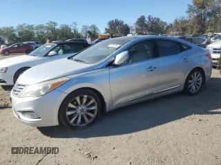 2013 Hyundai Azera с VIN KMHFH4JG4DA198549, выставлен на аукционе Copart как лот 76779744 с пробегом 213 433 миль миль и Чистый • Clean title. История ставок и продаж доступна на DreamBid. Изображение 1.