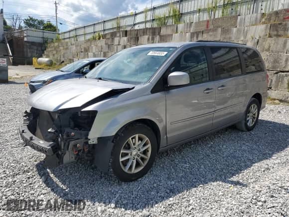 2016 Dodge Grand Caravan SXT with VIN 2C4RDGCG5GR367103, listed as a Copart auction lot 70564655 with 179,869 mi miles and Salvage title. Bid and sale history available at DreamBid. Image 1.