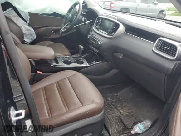 2019 Kia Sorento SX with VIN 5XYPK4A59KG452052, listed as a Copart auction lot 67530695 with 57,850 mi miles and Salvage title. Bid and sale history available at DreamBid. Image 7.