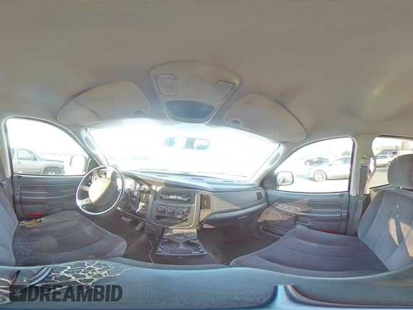 2005 Dodge 1500 SLT z VIN 1D7HA18N65S210786, wystawiony jako Copart lot #67089554 z przebiegiem 293 668 mil mil oraz Szkoda całkowita • Salvage title. Historia ofert i sprzedaży dostępna na DreamBid. Obrazek 13.