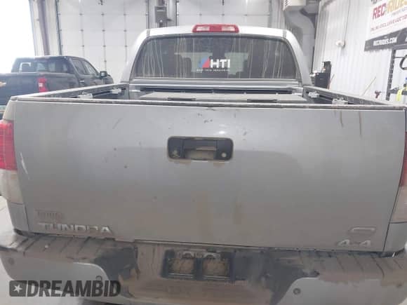 2013 Toyota Tundra Limited with VIN 5TFHW5F12DX289443, listed as a IAAI auction lot 42989623 with 195,739 mi miles and . Bid and sale history available at DreamBid. Image 16.