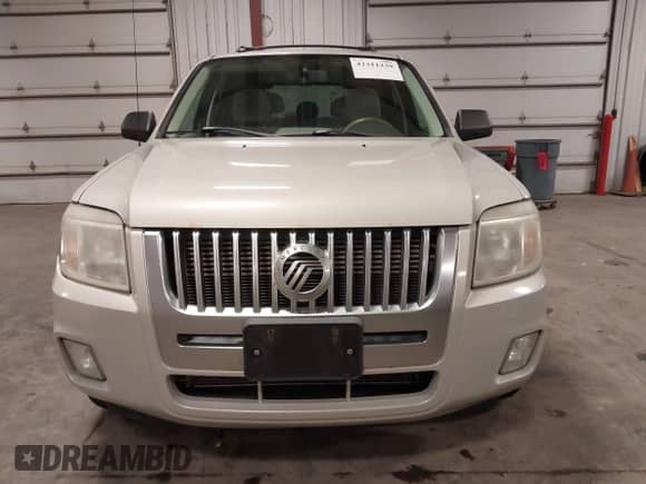 2008 Mercury Mariner with VIN 4M2CU91148KJ42603, listed as a IAAI auction lot 42311239 with 173,554 mi miles and . Bid and sale history available at DreamBid. Image 13.