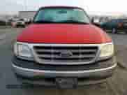 2001 Ford F-150 XL z VIN 2FTRF17W21CB04408, wystawiony jako Copart lot #79872124 z przebiegiem 82 773 mil mil oraz Szkoda całkowita • Salvage title. Historia ofert i sprzedaży dostępna na DreamBid. Obrazek 5.