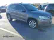 2011 Volkswagen Tiguan SE with VIN WVGAV7AX5BW548176, listed as a IAAI auction lot 41549614 with 134,708 mi miles and . Bid and sale history available at DreamBid. Image 1.