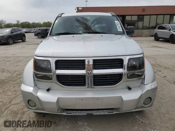 2008 Dodge Nitro SXT с VIN 1D8GU28K68W104944, выставлен на аукционе Copart как лот 51437924 с пробегом Не указан миль и На запчасти • Non repairable. История ставок и продаж доступна на DreamBid. Изображение 5.