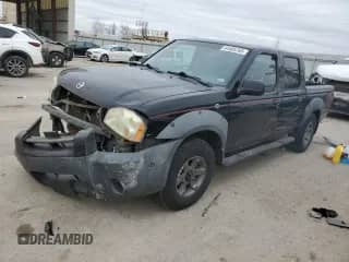 2003 Nissan Frontier XE with VIN 1N6ED27Y23C470824, listed as a Copart auction lot 44405765 with 259,203 mi miles and Salvage title. Bid and sale history available at DreamBid. Image 1.