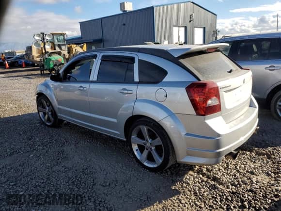 2008 Dodge Caliber с VIN 1B3HB68FX8D664451, выставлен на аукционе Copart как лот 84281964 с пробегом 118 320 миль миль и Списание • Salvage title. История ставок и продаж доступна на DreamBid. Изображение 2.