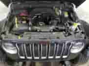 2021 Jeep Wrangler Unlimited Sahara High Altitude with VIN 1C4HJXEG9MW571844, listed as a Copart auction lot 81482334 with 77,409 mi miles and Salvage title. Bid and sale history available at DreamBid. Image 12.