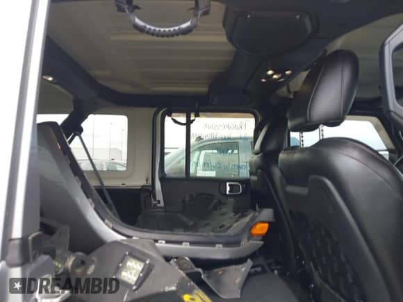 2021 Jeep Wrangler Unlimited Rubicon with VIN 1C4HJXFNXMW524545, listed as a IAAI auction lot 42774766 with 115,439 mi miles and . Bid and sale history available at DreamBid. Image 8.