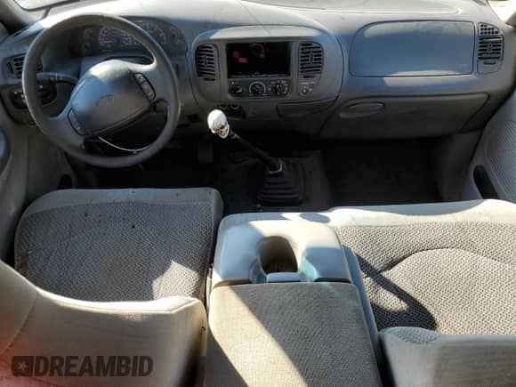 2000 Ford F-150 XL z VIN 1FTZX1729YNA19838, wystawiony jako Copart lot #58537575 z przebiegiem 254 403 mil mil oraz Czysty tytuł • Clean title. Historia ofert i sprzedaży dostępna na DreamBid. Obrazek 8.