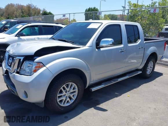 2015 Nissan Frontier SV with VIN 1N6AD0ER1FN726314, listed as a IAAI auction lot 42532117 with 61,991 mi miles and . Bid and sale history available at DreamBid. Image 2.