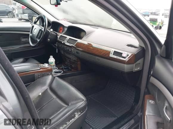 2005 BMW 7 Series 745Li with VIN WBAGN63595DS56807, listed as a IAAI auction lot 42018921 with 128,230 mi miles and . Bid and sale history available at DreamBid. Image 5.