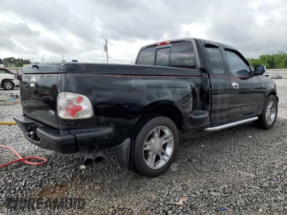 2000 Ford F-150 XL z VIN 2FTRX07L9YCA98470, wystawiony jako Copart lot #60734265 z przebiegiem Nie podano mil oraz Szkoda całkowita • Salvage title. Historia ofert i sprzedaży dostępna na DreamBid. Obrazek 3.