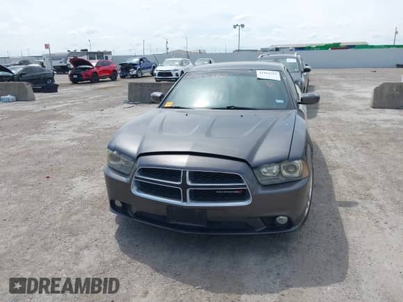 2013 Dodge Charger RT z VIN 2C3CDXCT5DH716883, wystawiony jako IAAI lot #41884762 z przebiegiem 240 867 mil mil oraz . Historia ofert i sprzedaży dostępna na DreamBid. Obrazek 12.