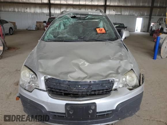 2014 Chevrolet Captiva Sport LS с VIN 3GNAL2EK5ES544633, выставлен на аукционе Copart как лот 71859704 с пробегом Не указан миль и Списание • Salvage title. История ставок и продаж доступна на DreamBid. Изображение 5.