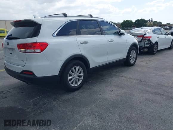 2016 Kia Sorento L with VIN 5XYPG4A39GG091994, listed as a IAAI auction lot 43068521 with 114,776 mi miles and . Bid and sale history available at DreamBid. Image 4.
