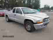 2004 Dodge Dakota SLT with VIN 1D7GL42K14S590088, listed as a IAAI auction lot 43106528 with 146,441 mi miles and . Bid and sale history available at DreamBid. Image 1.