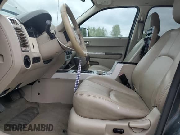 2008 Mercury Mariner Premier with VIN 4M2CU97118KJ01000, listed as a Copart auction lot 67403295 with 209,274 mi miles and Salvage title. Bid and sale history available at DreamBid. Image 7.