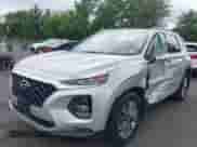 2019 Hyundai Santa Fe SEL with VIN 5NMS3CAD3KH119747, listed as a IAAI auction lot 42770505 with 122,041 mi miles and . Bid and sale history available at DreamBid. Image 16.