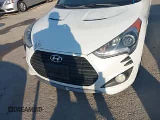 2014 Hyundai Veloster Turbo with VIN KMHTC6AE1EU192591, listed as a IAAI auction lot 43443000 with 125,556 mi miles and . Bid and sale history available at DreamBid. Image 6.