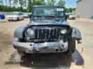 2015 Jeep Wrangler Sport with VIN 1C4AJWAG0FL749503, listed as a Copart auction lot 63664305 with 61,771 mi miles and Salvage title. Bid and sale history available at DreamBid. Image 5.