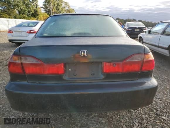1999 Honda Accord LX z VIN 1HGCG6650XA106100, wystawiony jako Copart lot #86077005 z przebiegiem 95 958 mil mil oraz Czysty tytuł • Clean title. Historia ofert i sprzedaży dostępna na DreamBid. Obrazek 6.