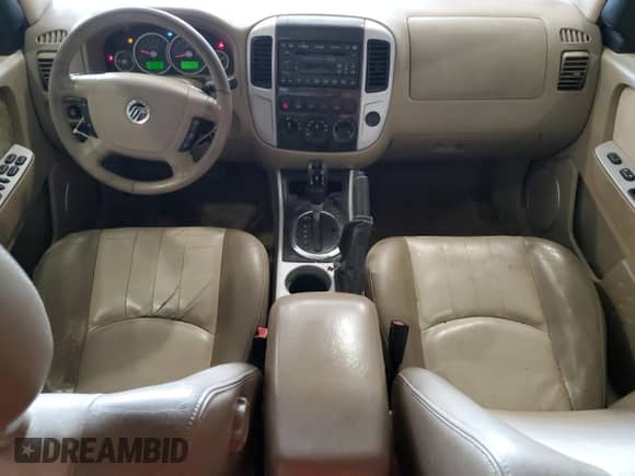 2007 Mercury Mariner Premier with VIN 4M2CU97107KJ05778, listed as a Copart auction lot 60433475 with 218,344 mi miles and Salvage title. Bid and sale history available at DreamBid. Image 8.