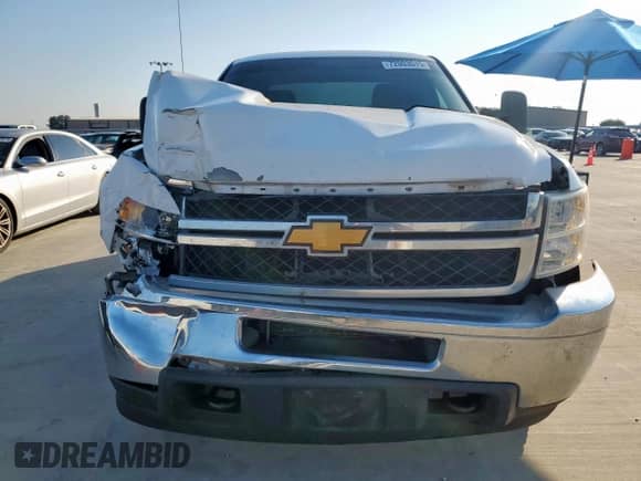 2013 Chevrolet Silverado 2500HD с VIN 1GB2KVCG1DZ378522, выставлен на аукционе Copart как лот 72003515 с пробегом 103 373 миль миль и Списание • Salvage title. История ставок и продаж доступна на DreamBid. Изображение 5.