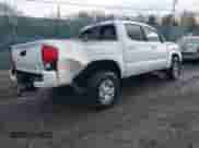 2019 Toyota Tacoma SR with VIN 3TMCZ5ANXKM257869, listed as a IAAI auction lot 41715668 with 99,452 mi miles and . Bid and sale history available at DreamBid. Image 4.