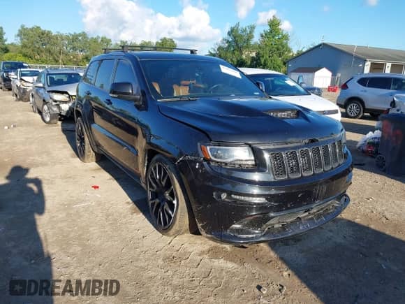 2014 Jeep Grand Cherokee SRT-8 с VIN 1C4RJFDJ4EC472220, выставлен на аукционе IAAI как лот 43057466 с пробегом 99 254 миль миль и . История ставок и продаж доступна на DreamBid. Изображение 1.