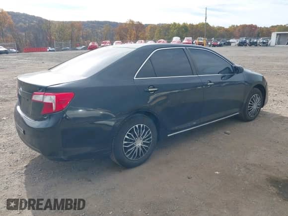 2014 Toyota Camry XLE with VIN 4T4BF1FK2ER354562, listed as a IAAI auction lot 43554838 with 197,062 mi miles and . Bid and sale history available at DreamBid. Image 4.