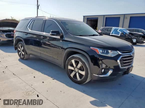 2018 Chevrolet Traverse LT с VIN 1GNERHKW7JJ135281, выставлен на аукционе Copart как лот 69400535 с пробегом 114 376 миль миль и Списание • Salvage title. История ставок и продаж доступна на DreamBid. Изображение 4.