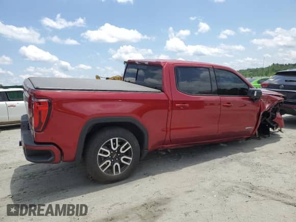 2023 GMC Sierra 1500 AT4 with VIN 1GTUUEEL3PZ183731, listed as a Copart auction lot 61771895 with 23,791 mi miles and Salvage title. Bid and sale history available at DreamBid. Image 3.