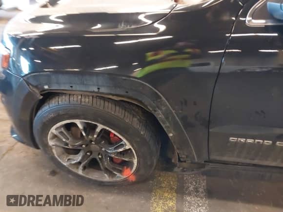 2014 Jeep Grand Cherokee SRT-8 с VIN 1C4RJFDJ9EC238350, выставлен на аукционе IAAI как лот 41036564 с пробегом 101 020 миль миль и . История ставок и продаж доступна на DreamBid. Изображение 18.