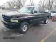 1999 Dodge 1500 z VIN 3B7HF13Z4XM579695, wystawiony jako IAAI lot #41795036 z przebiegiem 117 785 mil mil oraz . Historia ofert i sprzedaży dostępna na DreamBid. Obrazek 2.
