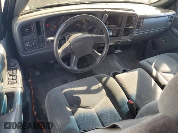 2005 Chevrolet Silverado 1500 Work Truck z VIN 1GCEC19V55Z327255, wystawiony jako Copart lot #71475115 z przebiegiem 211 799 mil mil oraz Szkoda całkowita • Salvage title. Historia ofert i sprzedaży dostępna na DreamBid. Obrazek 8.