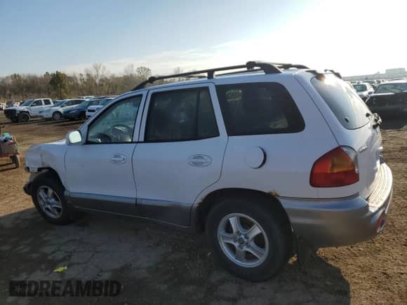 2001 Hyundai Santa Fe GLS с VIN KM8SC83D71U054852, выставлен на аукционе Copart как лот 78704454 с пробегом 100 591 миль миль и Списание • Salvage title. История ставок и продаж доступна на DreamBid. Изображение 2.