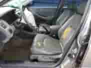 2000 Honda Accord EX с VIN 1HGCG5668YA061962, выставлен на аукционе Copart как лот 69822815 с пробегом 298 782 миль миль и Списание • Salvage title. История ставок и продаж доступна на DreamBid. Изображение 7.