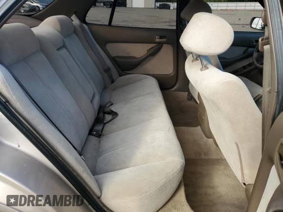 1995 Toyota Camry LE z VIN 4T1SK12E6SU898113, wystawiony jako Copart lot #82712455 z przebiegiem 170 935 mil mil oraz Szkoda całkowita • Salvage title. Historia ofert i sprzedaży dostępna na DreamBid. Obrazek 10.