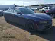 2015 Dodge Charger SE with VIN 2C3CDXBG3FH839993, listed as a Copart auction lot 70147505 with 162,671 mi miles and Salvage title. Bid and sale history available at DreamBid. Image 4.